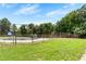Community pool area with surrounding greenery, offering a refreshing recreational space at 4908 Willow Lane Ln, Austell, GA 30106