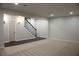 Spacious basement with ample lighting, plush carpeting and staircase at 1062 Lena Nw St, Atlanta, GA 30314