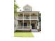 Charming two-story home featuring a double-decker front porch, perfect for enjoying outdoor living at 1062 Lena Nw St, Atlanta, GA 30314