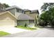 Exterior view of a multi-level home with garage and a private driveway at 1062 Lena Nw St, Atlanta, GA 30314