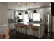 Bright kitchen with white cabinets, stainless steel appliances, granite countertops, and a large center island at 1062 Lena Nw St, Atlanta, GA 30314
