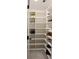 Well-organized walk-in closet with custom shelving for shoes and storage at 1062 Lena Nw St, Atlanta, GA 30314