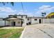 Backyard of property showing the extensive parking pad and large detached carport at 2403 Tiffany Pl, Decatur, GA 30035