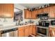 Well-equipped kitchen with stainless steel appliances and ample countertop space at 338 Saratoga Pl, Riverdale, GA 30296