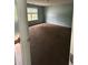 Bedroom with carpet flooring, a window, and neutral wall paint at 750 Ambrose Ln, Atlanta, GA 30349