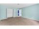 Bedroom featuring plush carpet, and closet at 750 Ambrose Ln, Atlanta, GA 30349