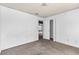 Bedroom featuring plush carpet, and open closet at 750 Ambrose Ln, Atlanta, GA 30349