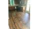 Kitchen with stainless steel appliances, wood cabinets and wood flooring at 750 Ambrose Ln, Atlanta, GA 30349