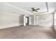 Large main bedroom offering neutral tones and ensuite access at 750 Ambrose Ln, Atlanta, GA 30349