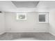 Finished basement space with two windows letting in natural light at 1102 Rogeretta Ne Dr, Atlanta, GA 30329