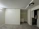 Basement room featuring custom built-in shelving units at 1102 Rogeretta Ne Dr, Atlanta, GA 30329