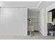 Basement storage area features custom shelving and utility access at 1102 Rogeretta Ne Dr, Atlanta, GA 30329