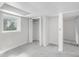 Basement bedroom with closet, carpeting, and natural light from one window at 1102 Rogeretta Ne Dr, Atlanta, GA 30329