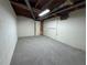 Finished basement with painted walls, new carpet, and doorway to another room at 1102 Rogeretta Ne Dr, Atlanta, GA 30329