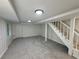 Basement featuring stairwell to the upper levels and a door to another room at 1102 Rogeretta Ne Dr, Atlanta, GA 30329