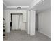 Finished basement features an opening to another room with bifold doors at 1102 Rogeretta Ne Dr, Atlanta, GA 30329