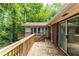 Multi-level wooden deck with scenic backyard views, ideal for enjoying nature and outdoor living at 1102 Rogeretta Ne Dr, Atlanta, GA 30329