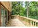 Wooden deck overlooking a lush, green backyard, perfect for outdoor relaxation and entertainment at 1102 Rogeretta Ne Dr, Atlanta, GA 30329