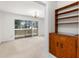 Charming dining room with a chandelier, sliding glass doors to the deck, and a built-in buffet at 1102 Rogeretta Ne Dr, Atlanta, GA 30329
