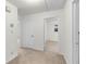 Hallway view features an adjacent room, linen closet and a nearby door at 1102 Rogeretta Ne Dr, Atlanta, GA 30329