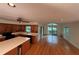 A well-lit kitchen boasts ample cabinets, modern appliances, an island, and access to the deck at 1102 Rogeretta Ne Dr, Atlanta, GA 30329