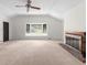 Inviting living room with a cozy fireplace and lots of natural light, awaiting your personal design at 1102 Rogeretta Ne Dr, Atlanta, GA 30329