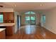 Bright living room featuring hardwood floors, natural light, and access to the outdoor deck at 1102 Rogeretta Ne Dr, Atlanta, GA 30329