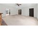 Bright living room featuring a ceiling fan, and adjacent rooms, awaiting your personal touch at 1102 Rogeretta Ne Dr, Atlanta, GA 30329