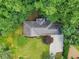 Aerial view of the home showing the roof, landscaping, and driveway at 2233 Clairmont Ne Rd, Atlanta, GA 30329