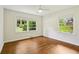 Bright bedroom with hardwood floors, a ceiling fan and great natural light at 2233 Clairmont Ne Rd, Atlanta, GA 30329