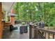 Spacious deck overlooking a serene backyard, complete with outdoor furniture for relaxation and entertaining guests at 2233 Clairmont Ne Rd, Atlanta, GA 30329