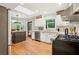 Modern kitchen with stainless steel appliances, skylight, and open layout at 2233 Clairmont Ne Rd, Atlanta, GA 30329