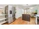 Bright kitchen featuring stainless steel appliances, a butcher block island and hardwood floors at 2233 Clairmont Ne Rd, Atlanta, GA 30329