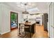 Bright kitchen with skylight, center island, stainless steel appliances, and backyard access at 2233 Clairmont Ne Rd, Atlanta, GA 30329