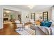 Open living room layout with hardwood floors, fireplace, and comfortable seating at 2233 Clairmont Ne Rd, Atlanta, GA 30329