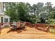 Spacious wooden deck featuring outdoor dining table and chairs at 4047 Dunwoody Club Dr, Dunwoody, GA 30350
