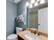 This bathroom features granite countertops, modern sink, and a glass door shower at 4047 Dunwoody Club Dr, Dunwoody, GA 30350