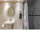 Bathroom featuring a shower, toilet, decorative mirror, and sink at 4047 Dunwoody Club Dr, Dunwoody, GA 30350