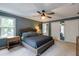 This main bedroom features neutral walls, carpeted floors, and a ceiling fan, creating a serene retreat at 4047 Dunwoody Club Dr, Dunwoody, GA 30350