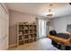 Home office with a bookshelf, rolling chair, and neutral walls at 4047 Dunwoody Club Dr, Dunwoody, GA 30350