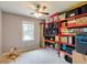 A storage room featuring red shelving units and boxes at 4047 Dunwoody Club Dr, Dunwoody, GA 30350