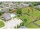 Aerial view showing the home's location, the community pool, and its proximity to green spaces at 4455 Orchard Lake Dr, Cumming, GA 30028