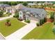 Charming two-story home with manicured lawn and complementary landscaping at 4455 Orchard Lake Dr, Cumming, GA 30028