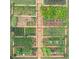 Aerial view of a well-organized square garden, featuring a variety of garden plots at 4455 Orchard Lake Dr, Cumming, GA 30028