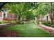 Serene community courtyard with manicured lawn and inviting walking paths at 827 Perennial Dr, Atlanta, GA 30328