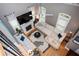 Bright living room with fireplace, hardwood floors, large sectional couch, and modern decor at 827 Perennial Dr, Atlanta, GA 30328