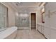 Spacious bathroom features a glass enclosed shower, double vanity, and a soaking tub at 1169 Dorby Park Ne Dr, Brookhaven, GA 30319