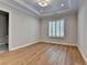 Inviting bedroom with hardwood floors, plantation shutters, and elegant recessed lighting at 1169 Dorby Park Ne Dr, Brookhaven, GA 30319