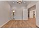 Bright bedroom features hardwood floors and white trim and is connected to a bathroom at 1169 Dorby Park Ne Dr, Brookhaven, GA 30319