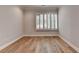 Bright bedroom with hardwood floors, trimwork and large windows bringing in natural light at 1169 Dorby Park Ne Dr, Brookhaven, GA 30319